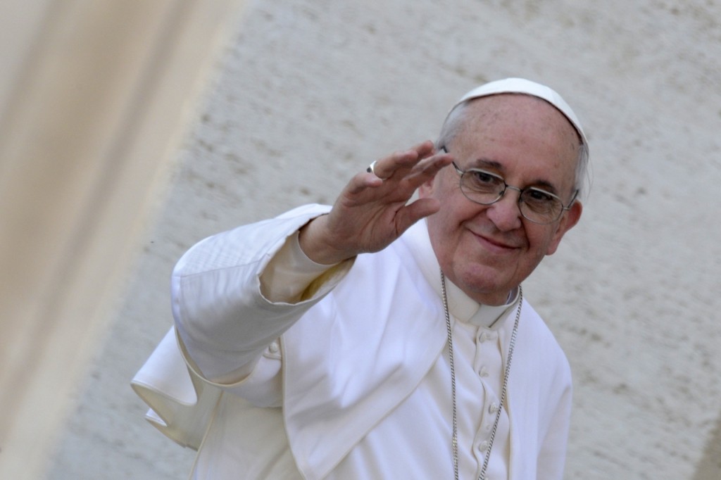 Pope Francis waves as he leaves at the end of a mass at St Peter's square as part of the Palm Sunday celebration on March 24, 2013 at the Vatican. The Palm Sunday marks the start of the holy week of Easter in celebration of the crucifixion and resurrection of Jesus Christ.   AFP PHOTO / ANDREAS SOLARO        (Photo credit should read ANDREAS SOLARO,ANDREAS SOLARO/AFP/Getty Images)